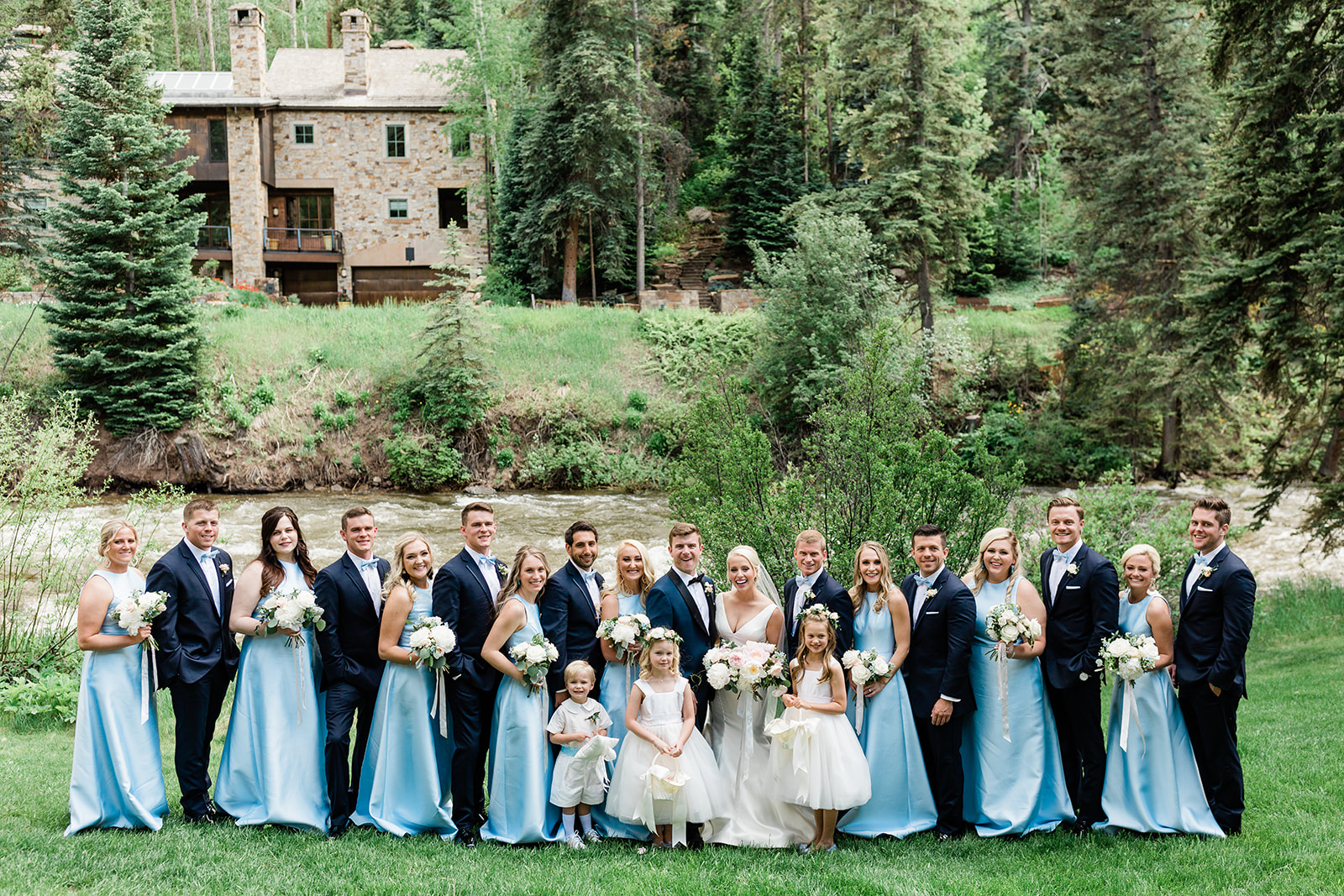 bridal party portrait in front of Colorado mountain river