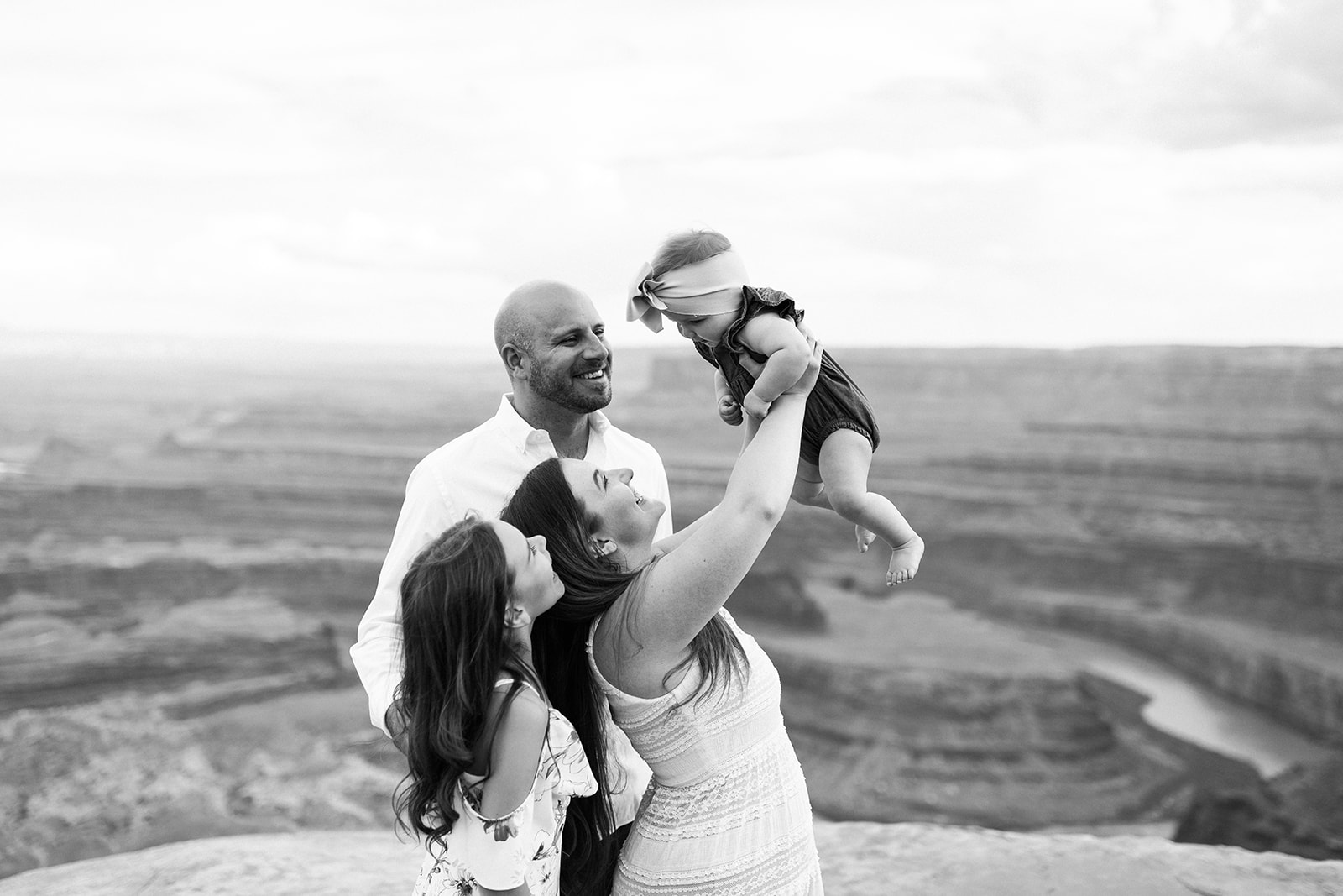 family photo in front of Moab landscape