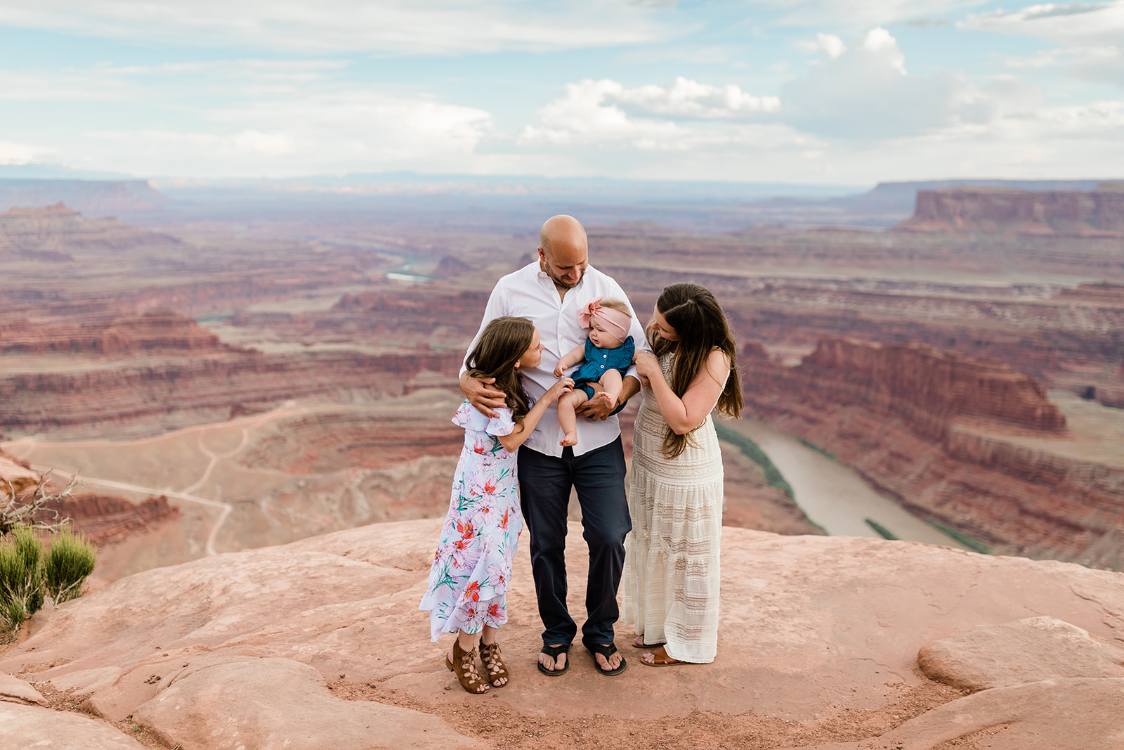 family photo in front of Moab landscape