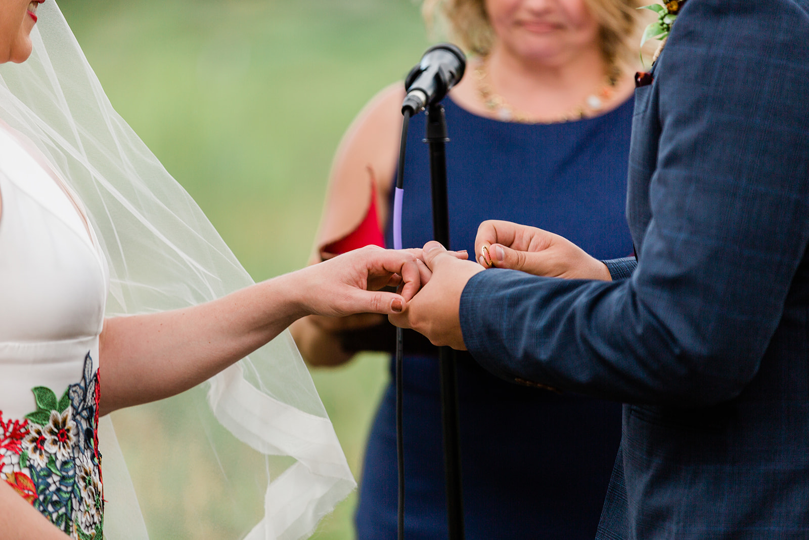 exchange of rings at outdoor southwest wedding
