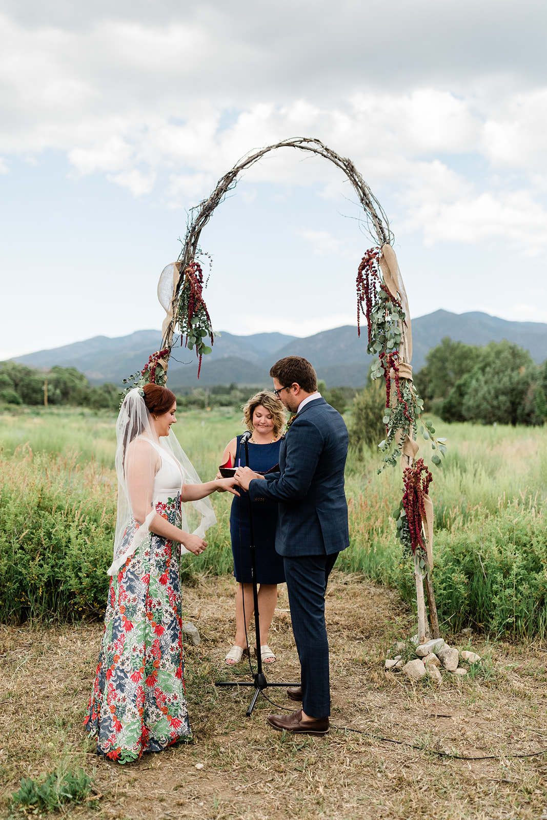 exchange of rings at outdoor southwest wedding