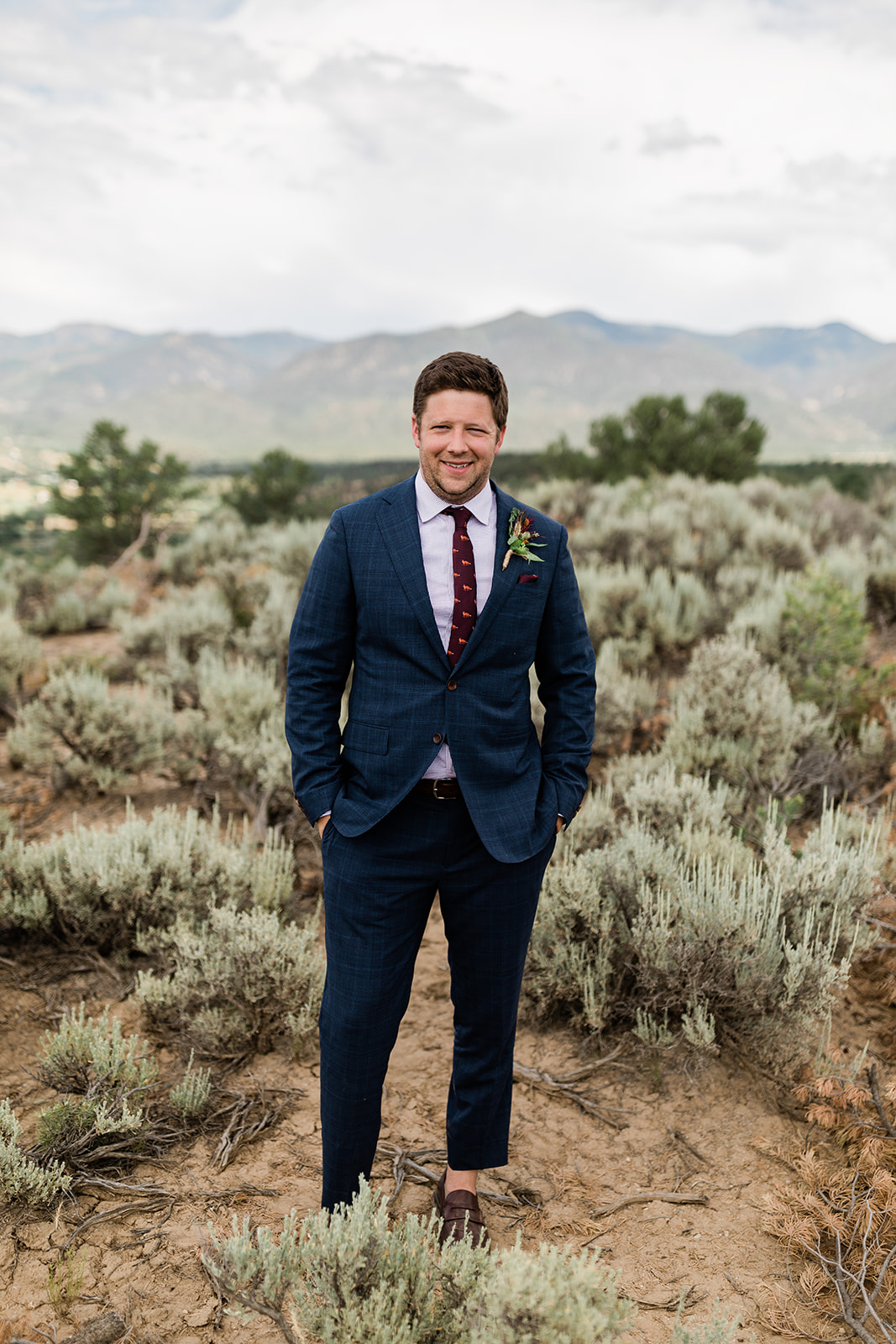 groom portrait before wedding in Taos desert