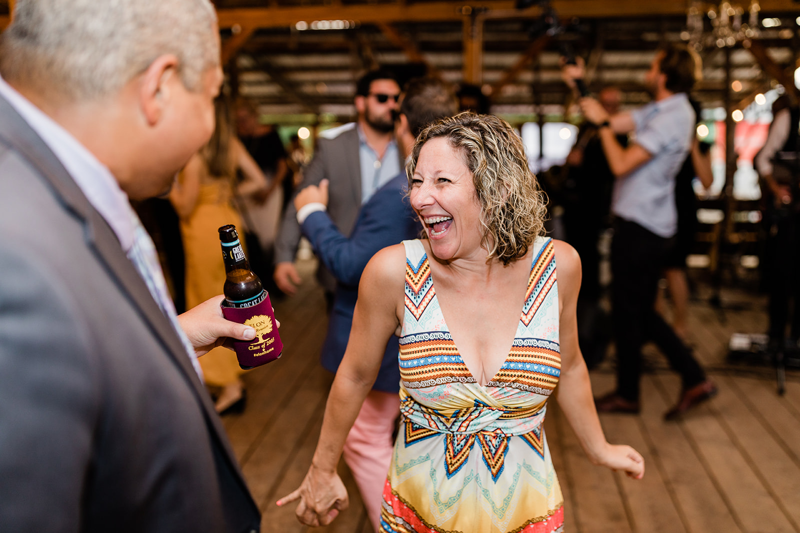 guests dance at reception 