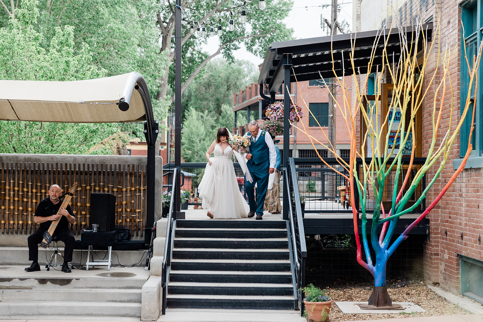 bride walks down aisle at Salida Colorado wedding