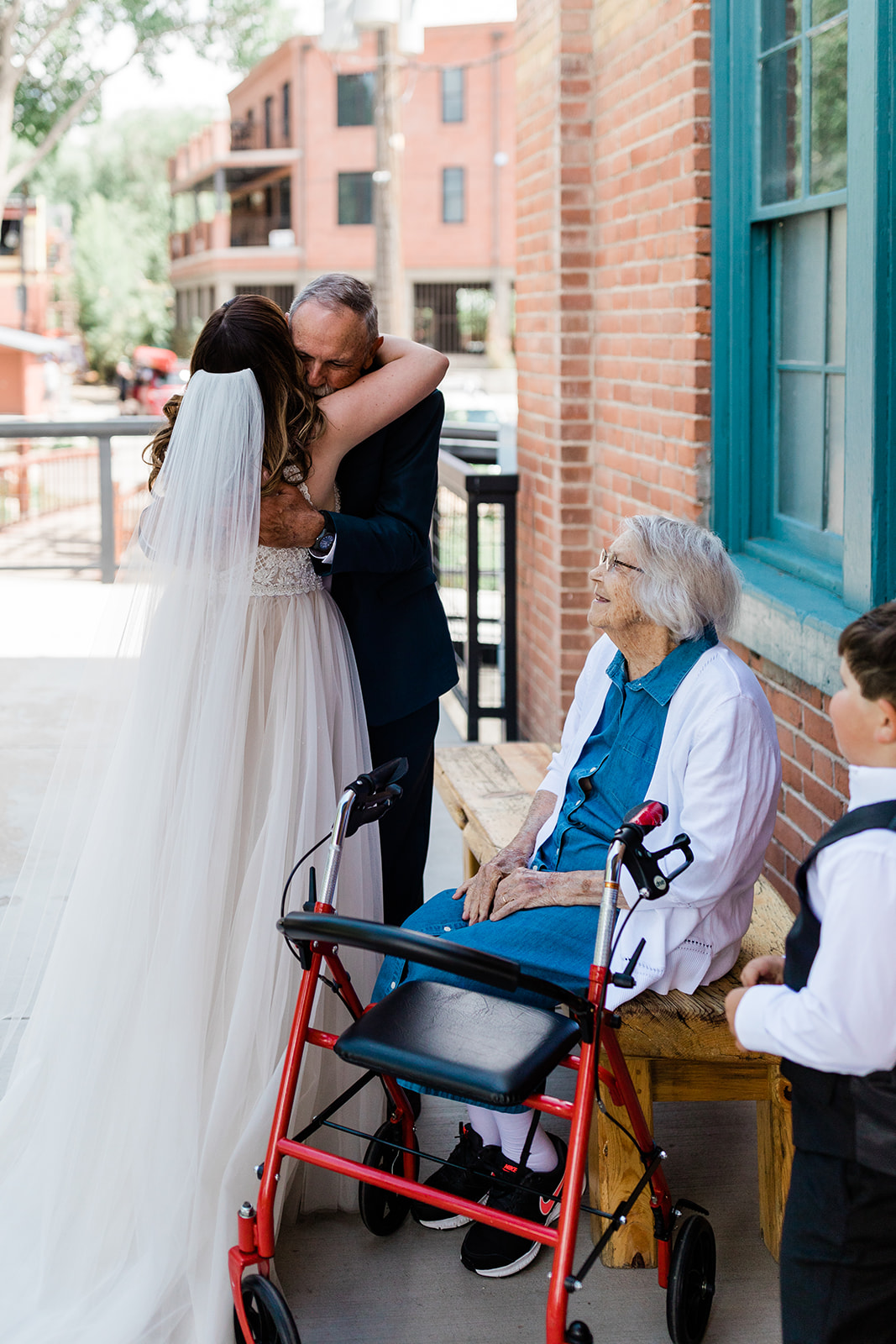 bride greets wedding guests before ceremony