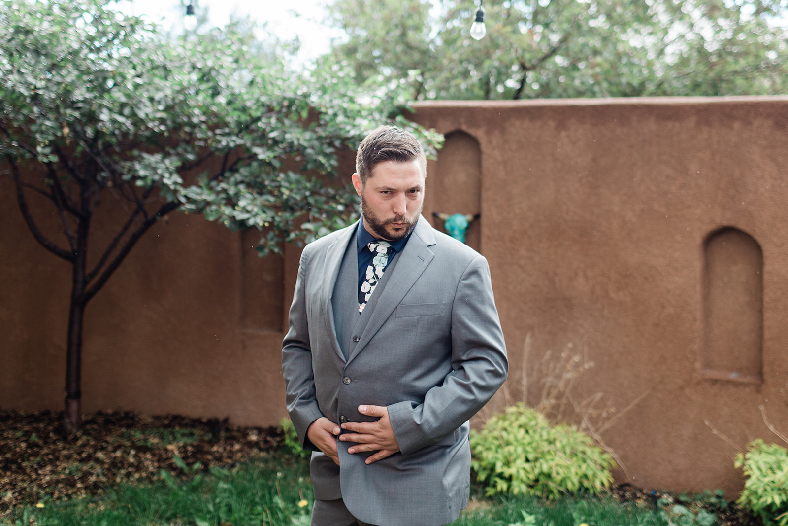 groom gets ready for first look outside Salida Colorado