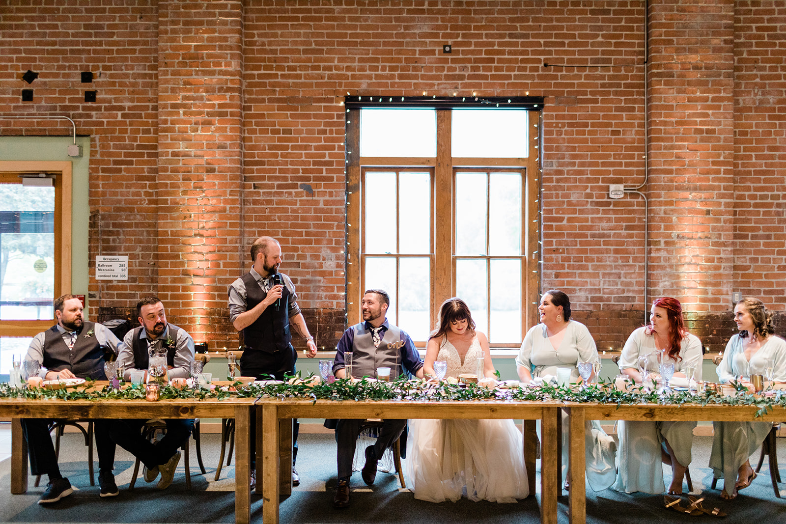 guests toast bride and groom during Salida wedding reception