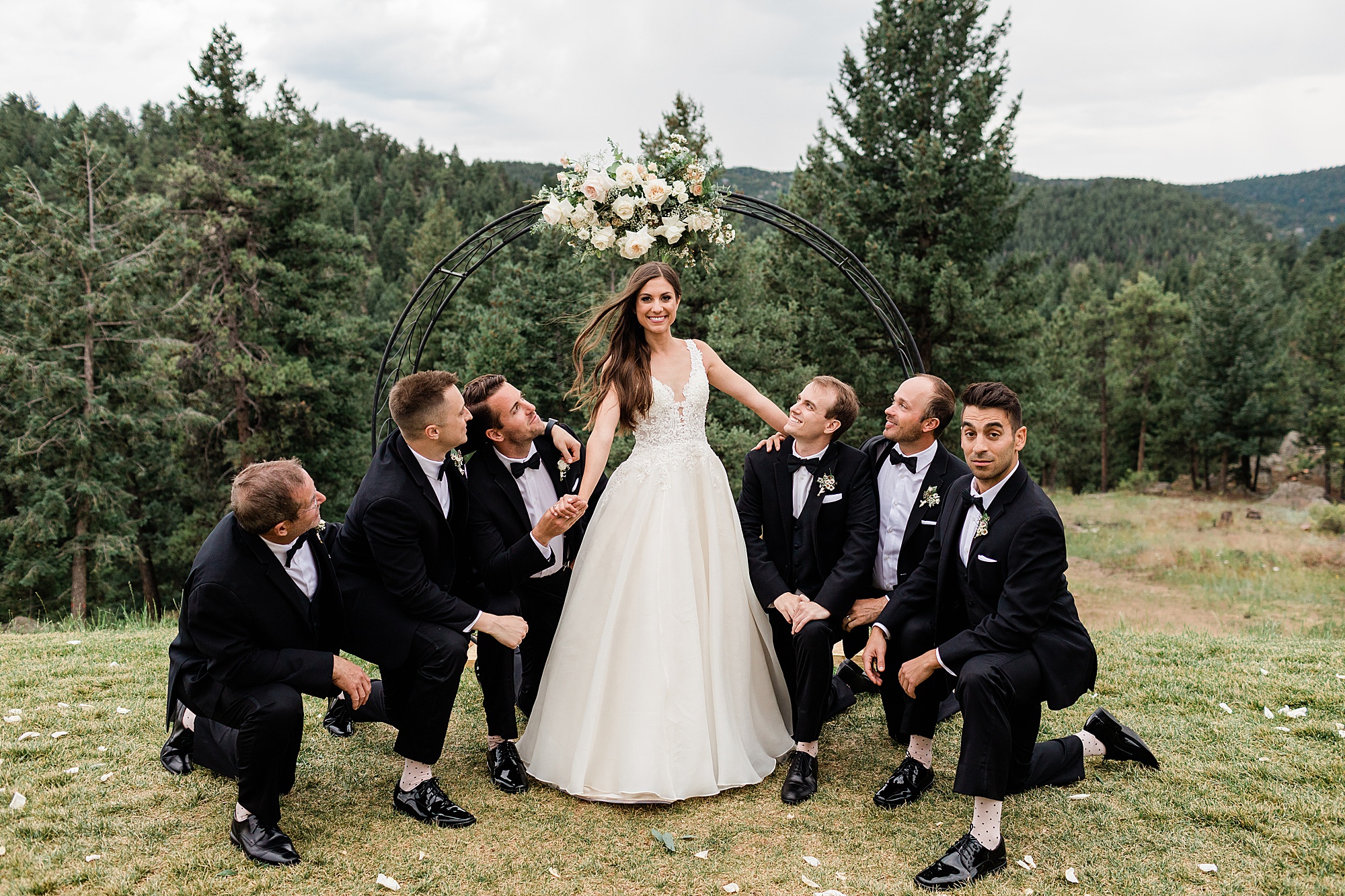 woodlands colorado wedding bride with groomsmen