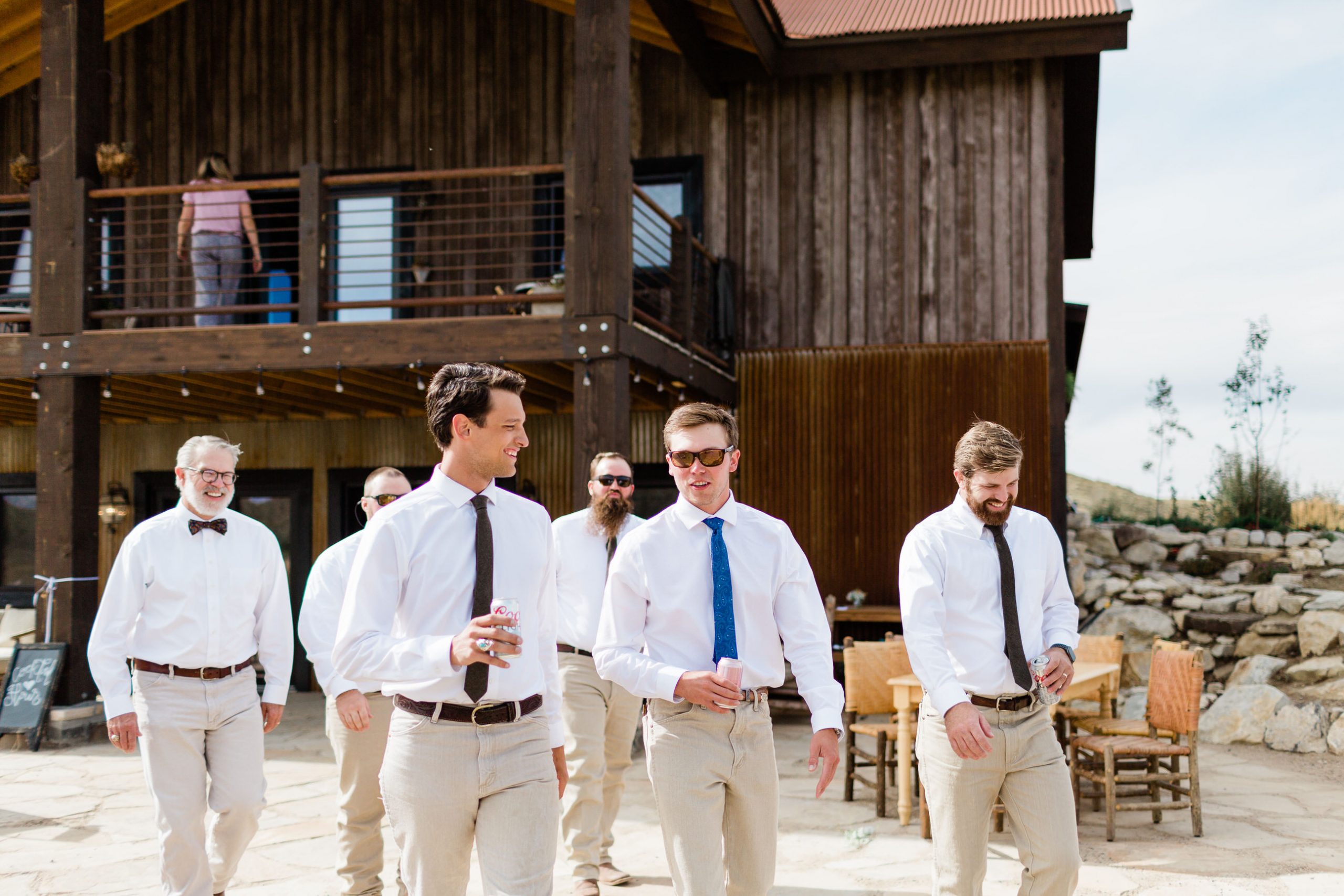 groomsmen pose with instruments for portrait