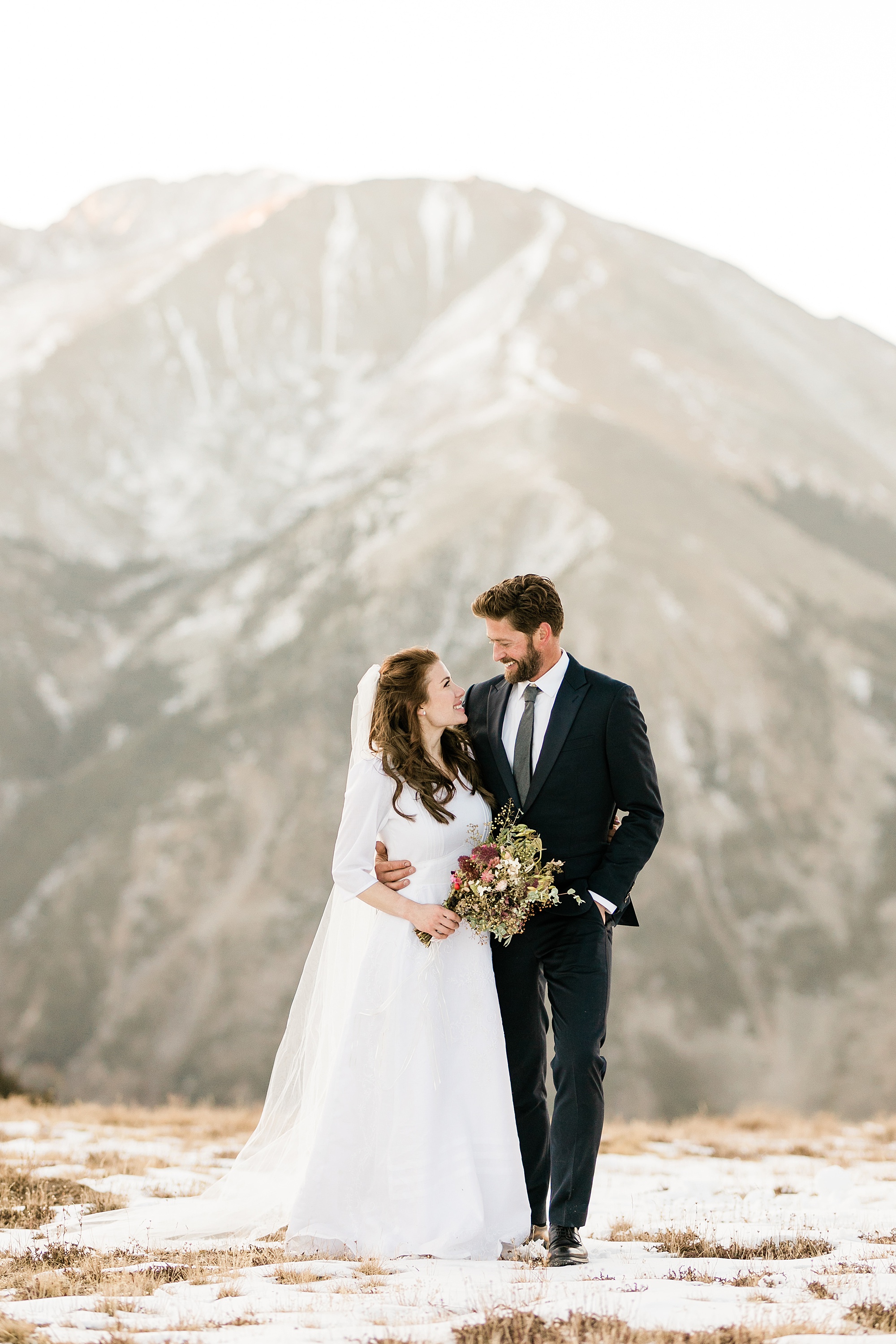 bride and groom mountain portraits
