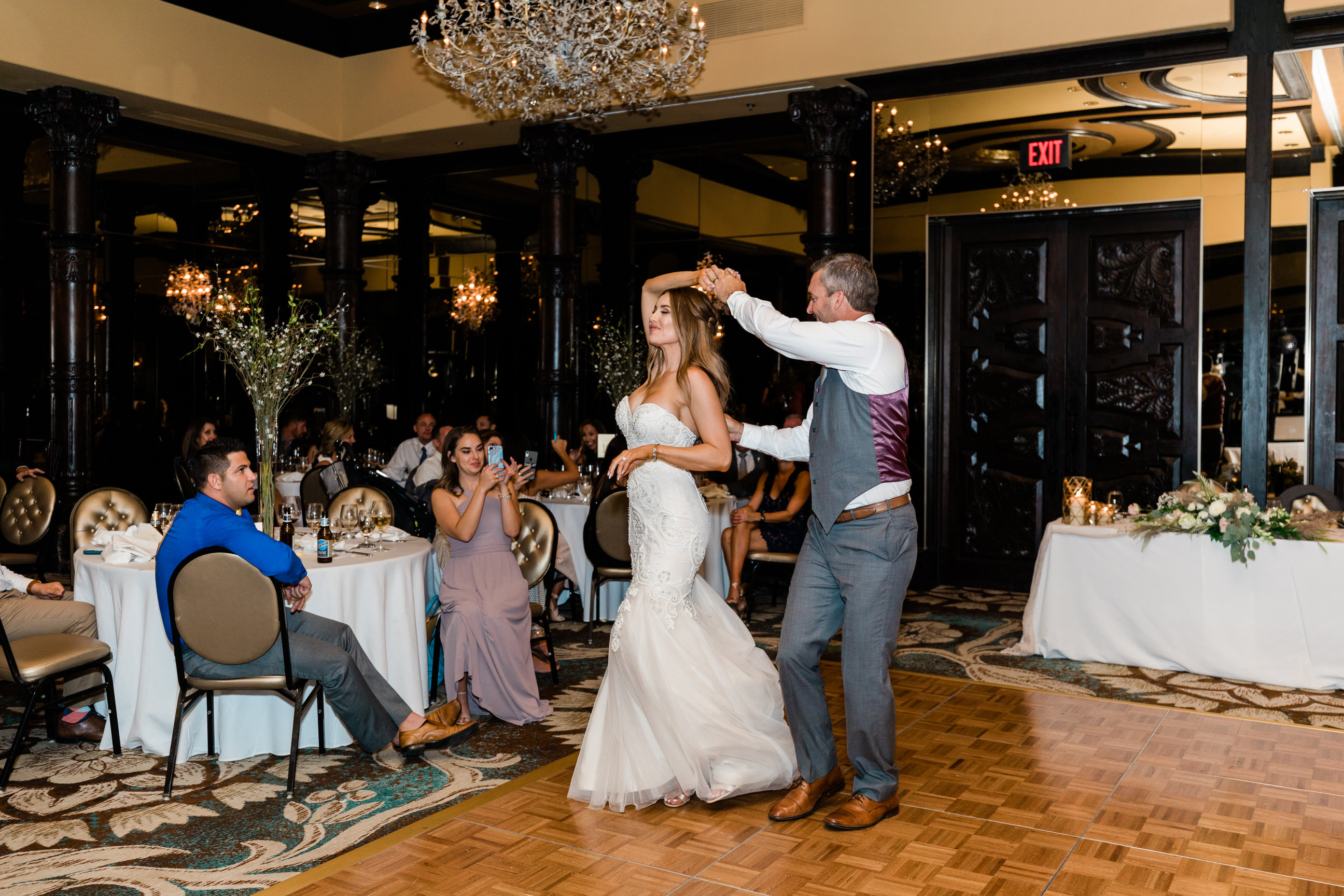 bride and groom first dance at wedding reception 