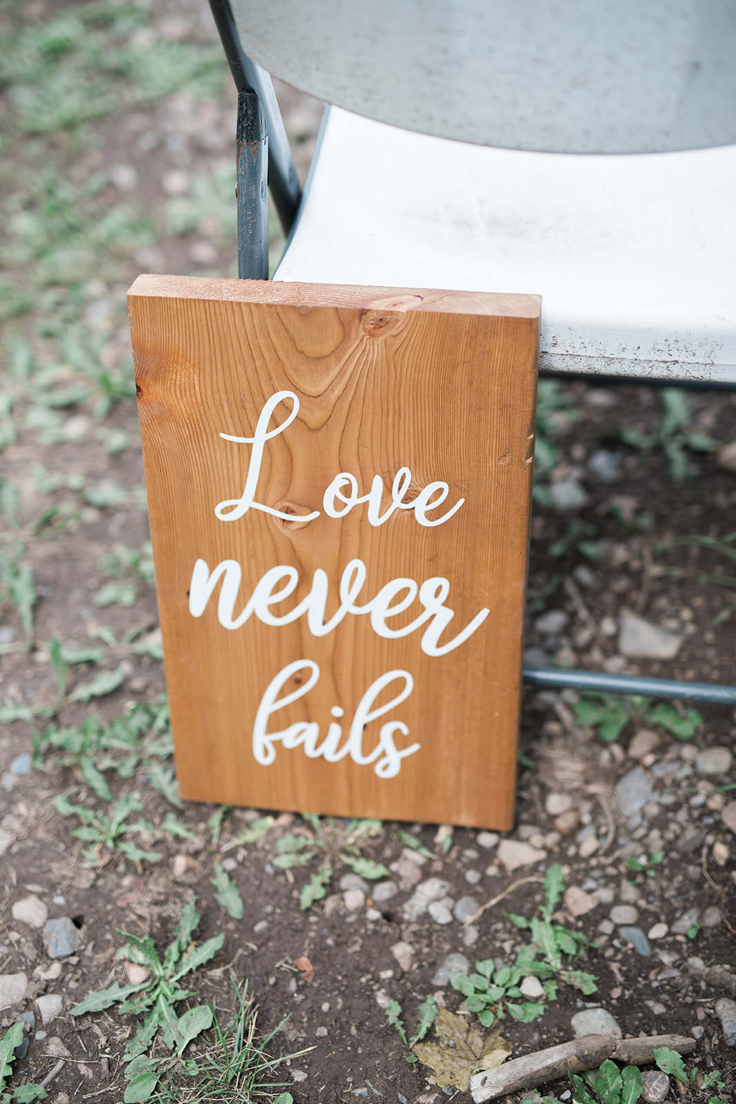 love never fails wedding ceremony sign