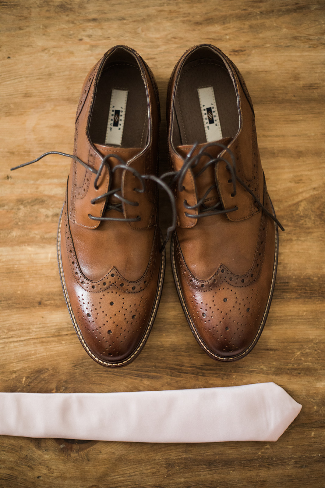 groom's shoes and tie Silverpick Lodge
