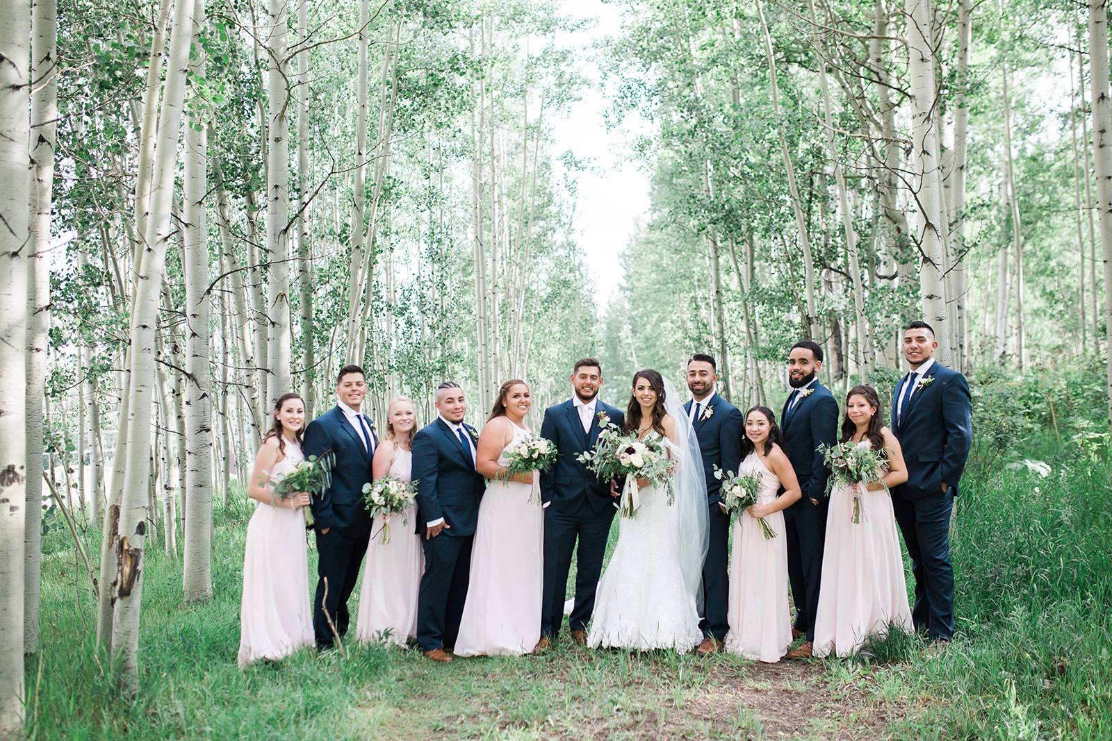 whole bridal party in Durango aspen grove