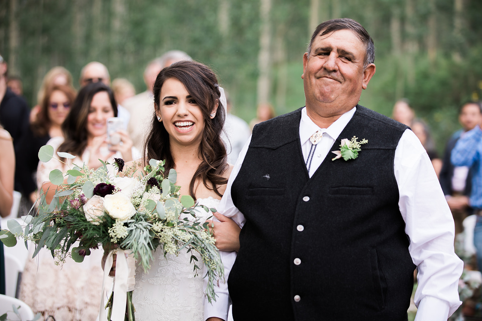 bride's father walks her down the aisle at Silverpick Lodge