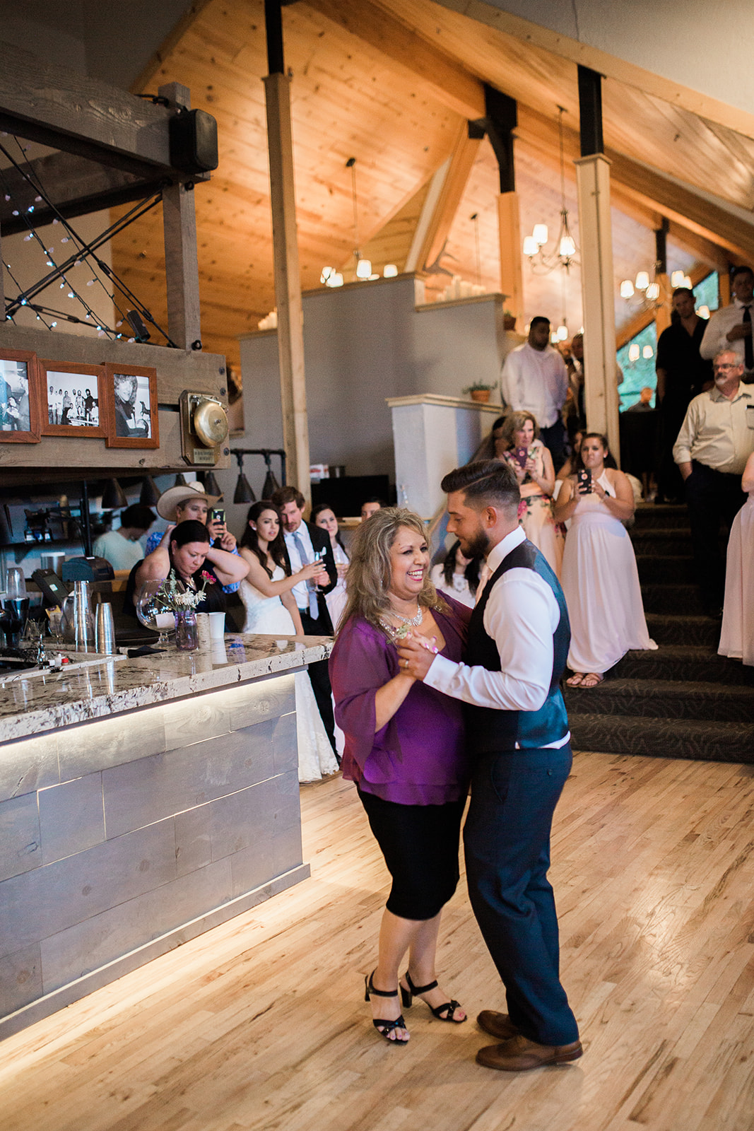 groom and groom's mother dance at wedding reception in Durango Colorado