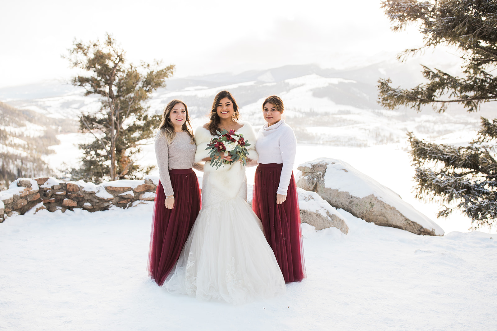 bride and bridesmaids in front of Sapphire Point