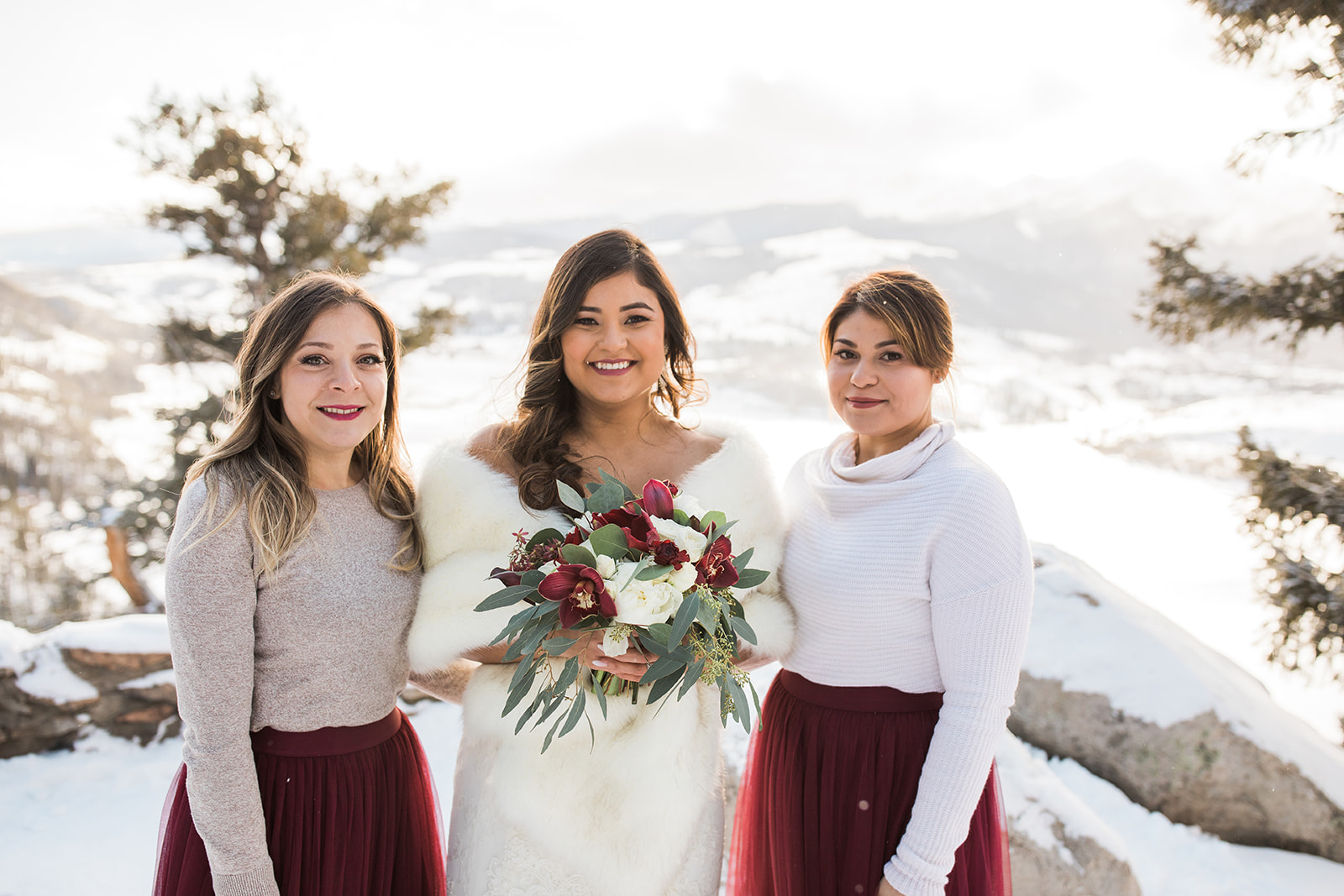 bride and bridesmaids in front of Sapphire Point