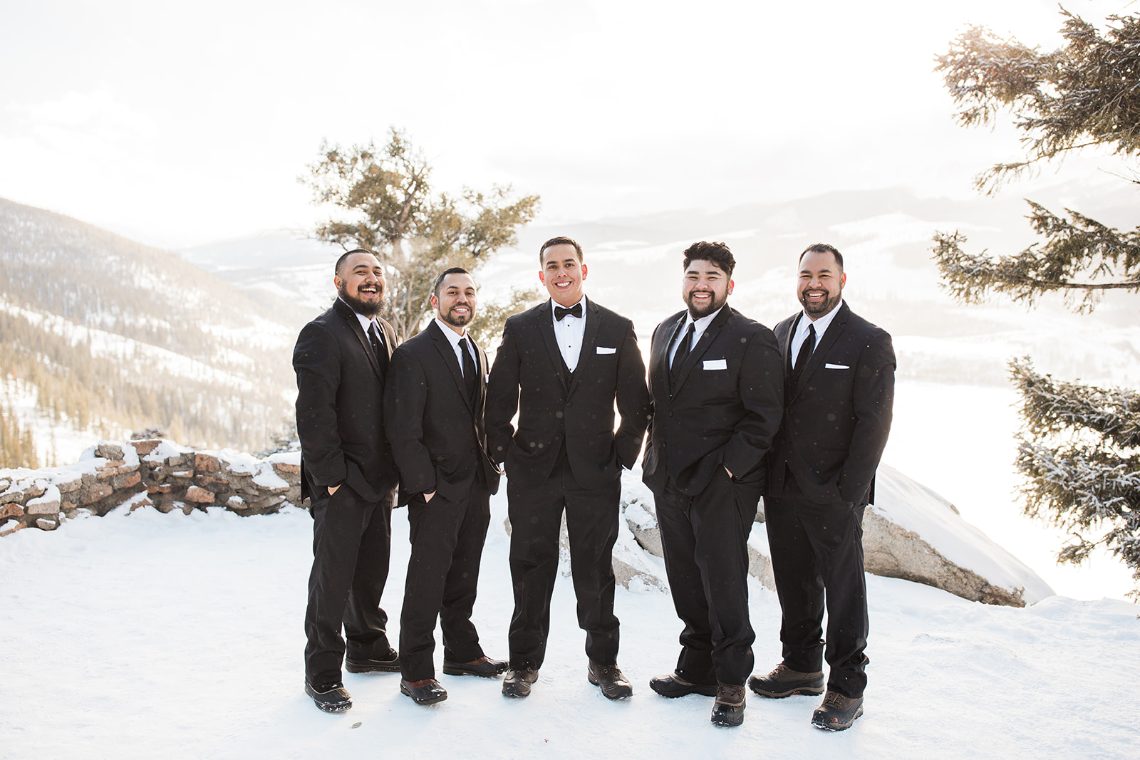groom and groomsmen in front of Sapphire Point