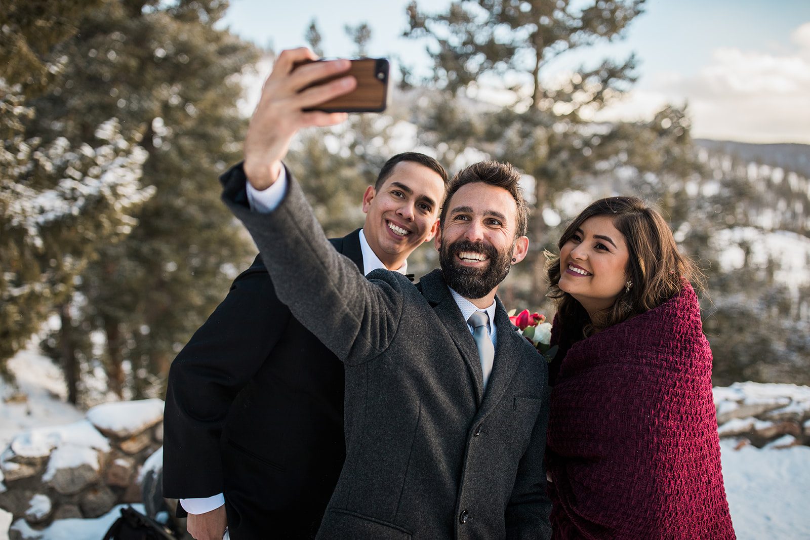 bride and groom selfie with efficient in Colorado mountain elopement ceremony