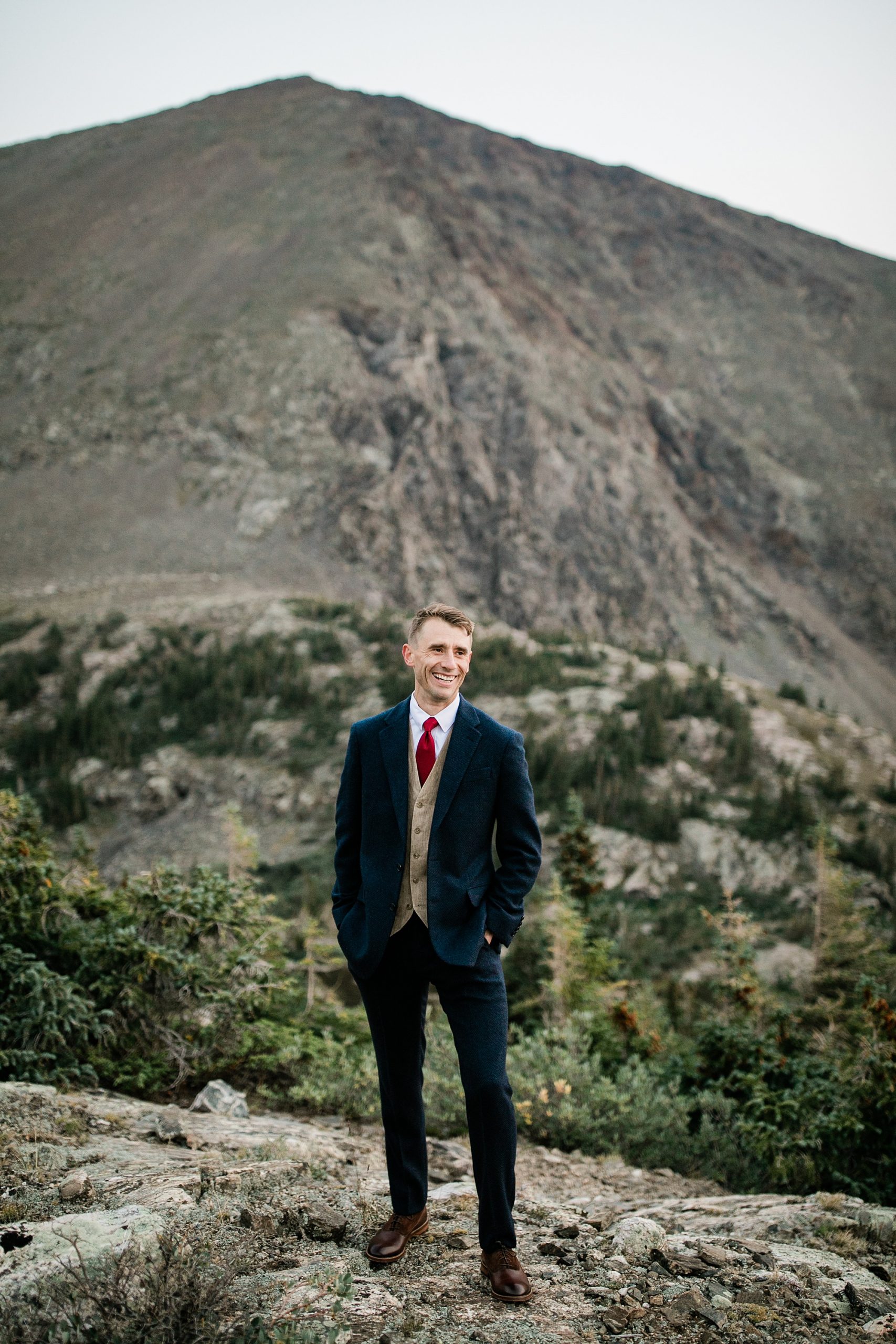 groom in the mountains
