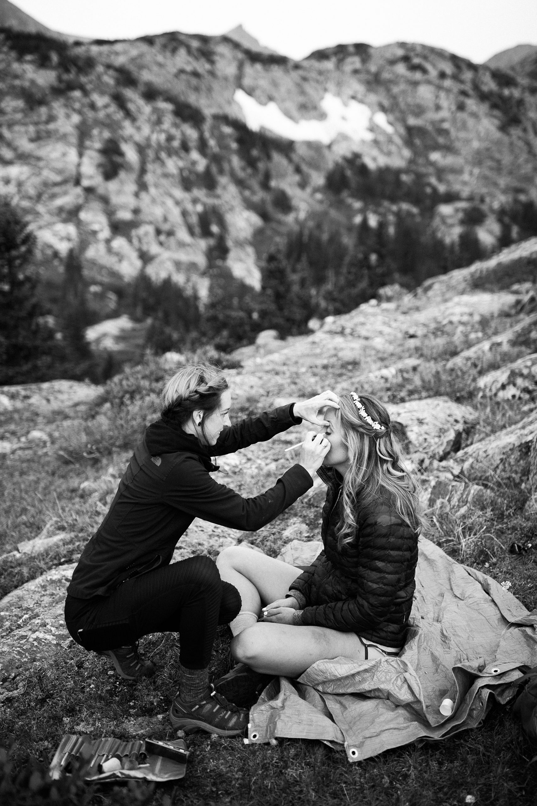 bride getting ready for elopement in mountains