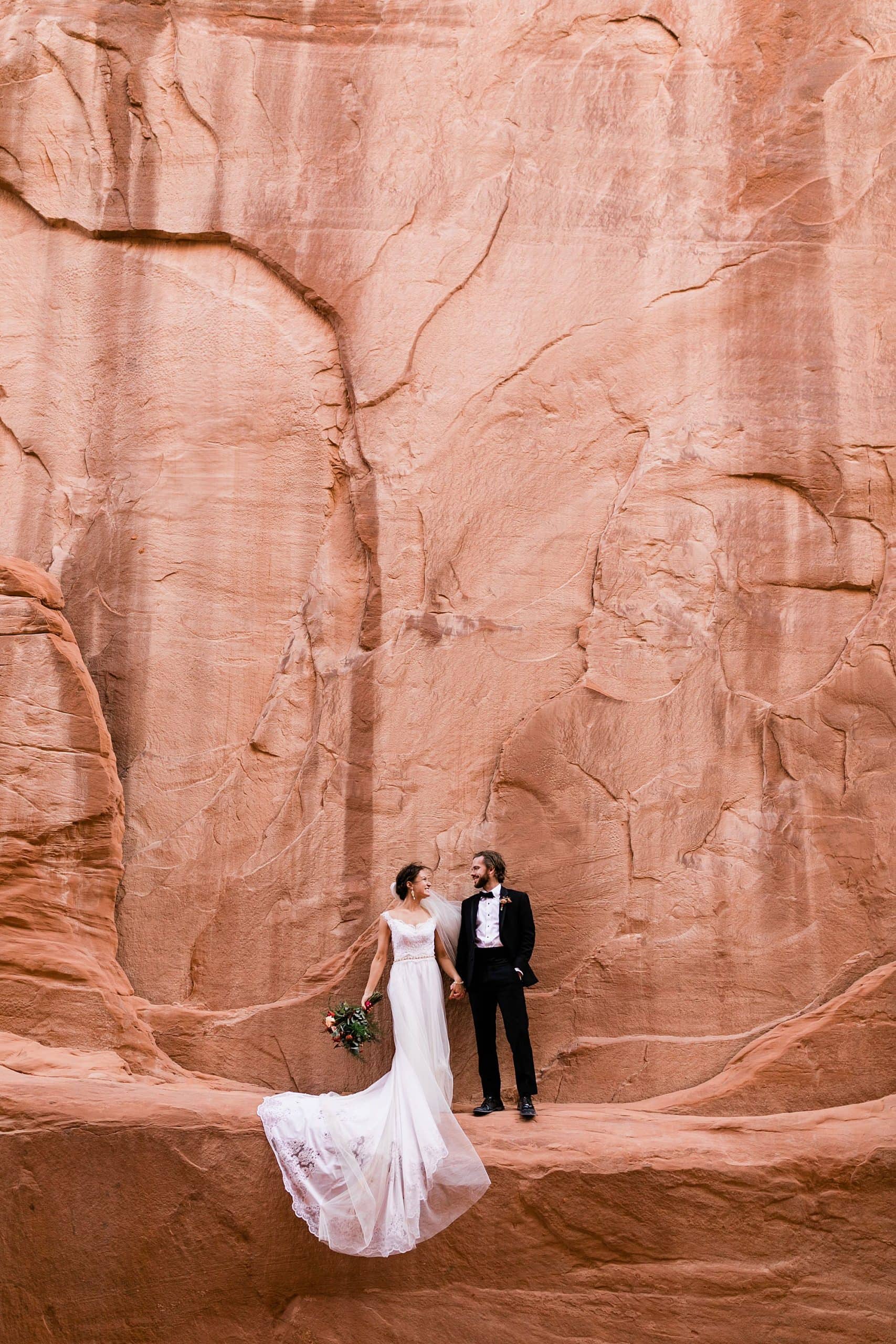 A couple faces one another after they elope in Moab.